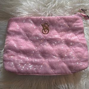 Victoria’s Secret sequin makeup bag. Used once. Slight blemish on bottom of bag.